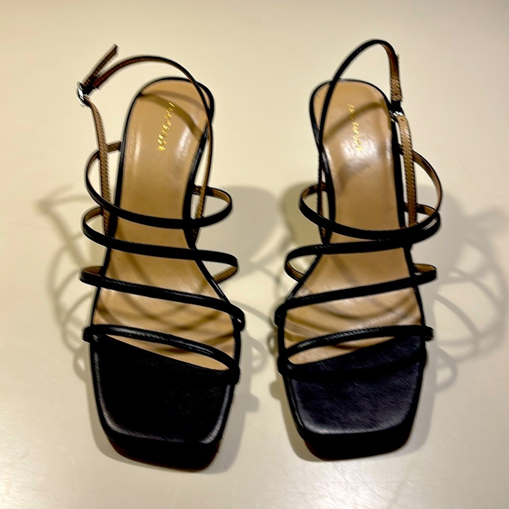 Black strappy sandles  like new. 3” heal
